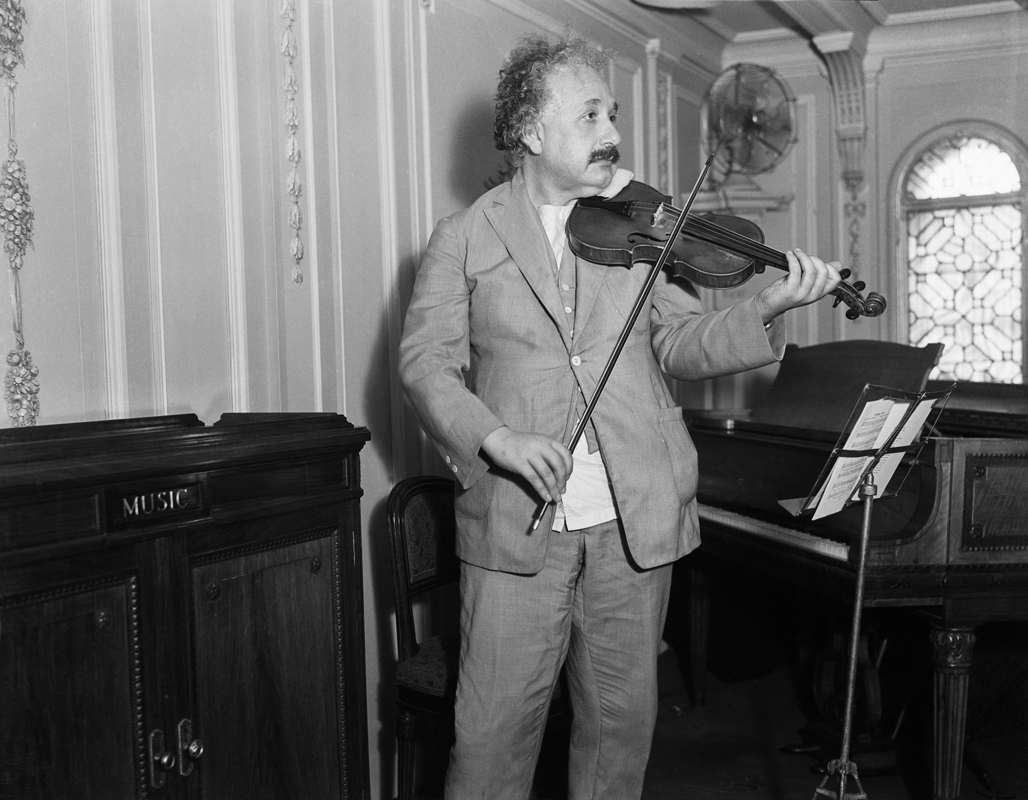 Albert Einstein playing his violin