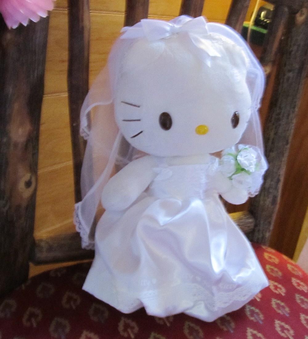 Hello Kitty wearing a wedding dress